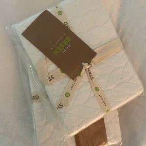 Pair West Elm white organic cotton standard shams